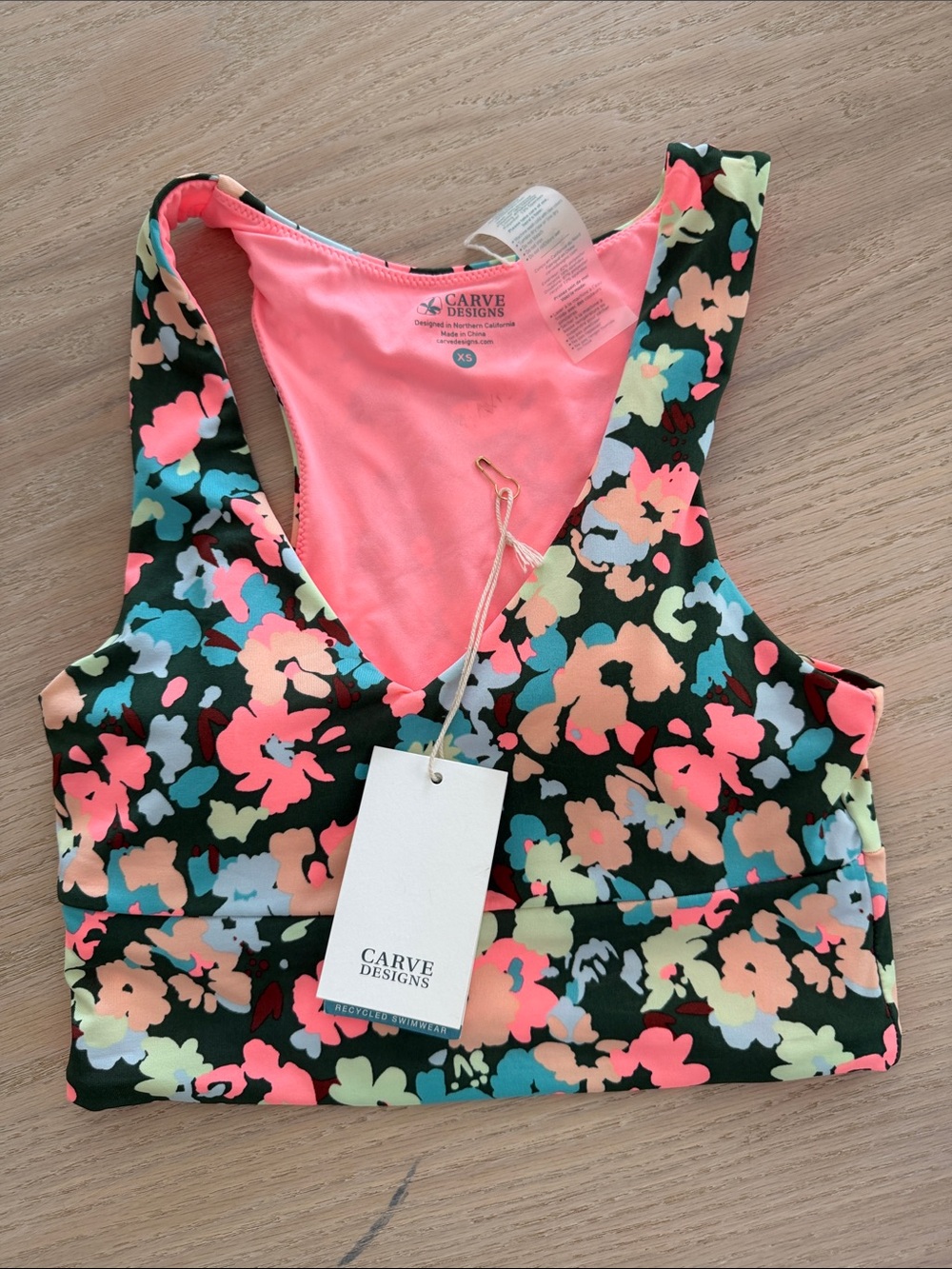 Carve Designs Women's Floral Sports Bikini Top - Black Multi with Coral Lining